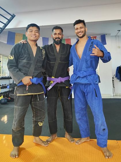 My first two colored belts, Jitendra and Long. They have been with me through it all and perfectly represent the values of loyalty and hard work we stand for.
