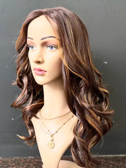 Our creamy blonde custom wig is another stunning option for a glamorous look. The color is rich and the waves are styled for a soft, romantic feel.
