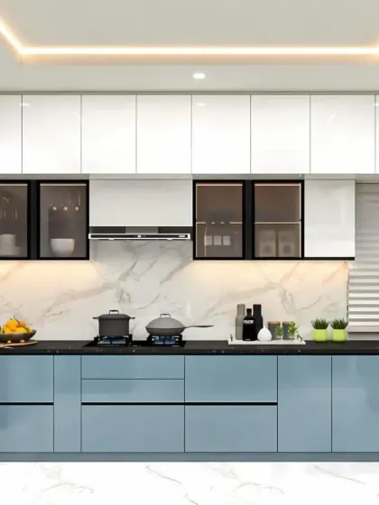 This modular kitchen design combines style and efficiency. I used high-gloss white upper cabinets to create a sense of space, paired with calming blue lower cabinets. The design includes a marble-patterned backsplash, under-cabinet lighting for task areas, and smart storage solutions to keep the countertop clutter-free.