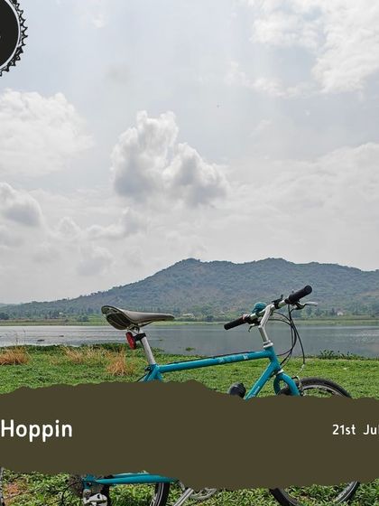 A single bike parked by a lake on our 'Lake Hoppin' tour. Sometimes it's about the quiet moments of solitude in nature.