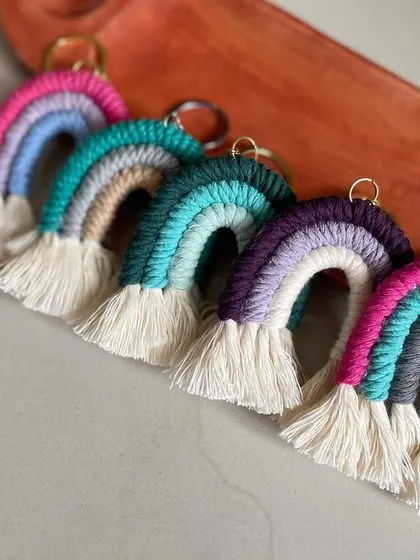 Rainbows just make everyone happy! These are some of my macrame rainbow keychains, which are very popular as bag charms or return gifts for kids' parties. I use soft cotton threads in so many color combinations.