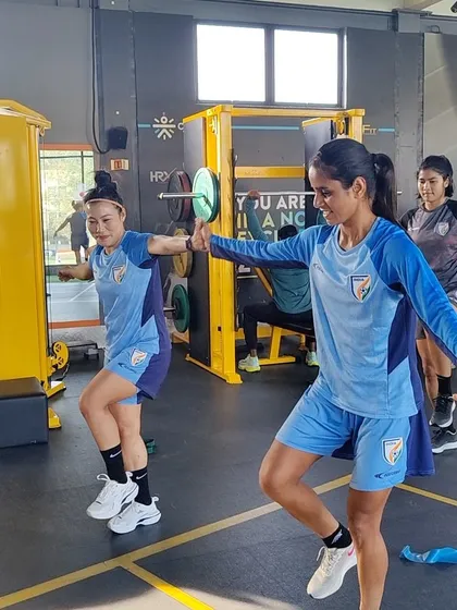 Our coaches use priming drills and challenges to make warm-ups fun, focused, and effective. This image shows athletes from the Indian national team engaged in a proprioception drill to improve balance and reaction time.
