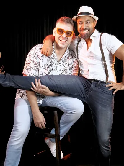 More proof that we take our goofing around more seriously than modeling. Just a couple of guys, a chair, and some next level leg poses.