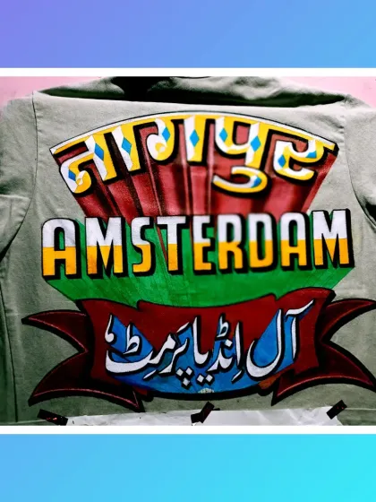 This jacket was a special commission connecting two cities, Nagpur and Amsterdam, through art. I used my calligraphy skills to paint the city names in three different scripts: Devanagari, English, and Urdu, set against a backdrop of bold, truck art-inspired graphics.