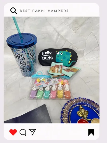 This Rakhi hamper is filled with treats and love, including a cool sipper cup, a dinosaur eye mask, and colourful stamps.