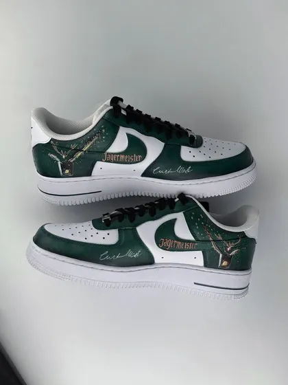 A top-down view of the finished Nike Air Force 1 custom-painted for Jägermeister. This showcases the detailed, high-quality artwork that serves as a lasting piece of merchandise from our live art events.
