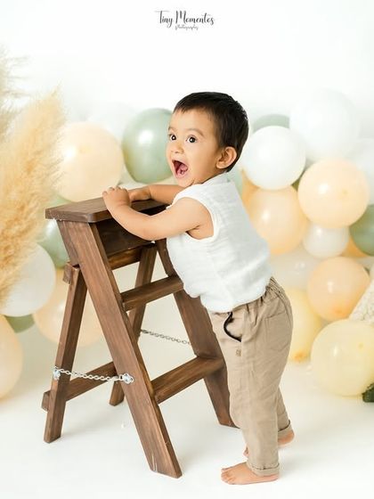 Adventure awaits. This little one is ready to climb, and I'm ready to capture his determined and excited expression.