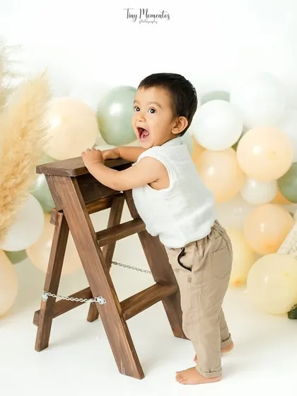 Adventure awaits. This little one is ready to climb, and I'm ready to capture his determined and excited expression.