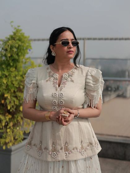 A poised shot from a Haldi ceremony. Even in the midst of high energy fun, I maintain a professional presence to guide the event smoothly.