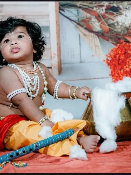 An adorable baby boy dressed as Little Krishna for a themed photoshoot. We love bringing creative ideas to life to celebrate your baby's milestones in a fun and memorable way.