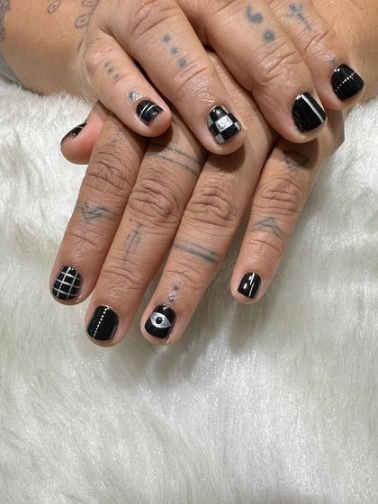 Another angle of this custom black and white geometric set. Each nail tells a different story, creating a look that's totally unique to the client.
