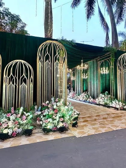 A slightly different angle of the entrance, showing the path leading into the celebration.