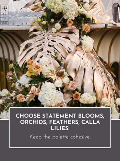 To achieve a cohesive, high-end look, I teach students to choose statement blooms like orchids and calla lilies and pair them with unique elements like feathers and painted monstera leaves. This is how you create a memorable visual impact.
