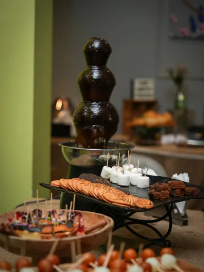 My parties are a treat for all the senses. A flowing chocolate fountain with marshmallows and cookies is a sweet centerpiece that kids and adults both love.