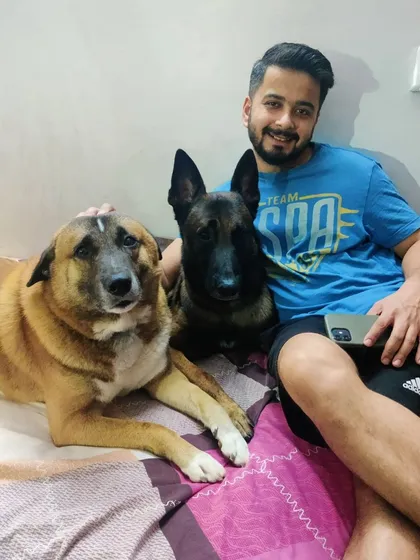 These are my two teachers, Brownie and Jax. They are the reason I do what I do. From a rescued desi dog to a high-energy Belgian Malinois, they have taught me more about love, patience, and communication than any book ever could.