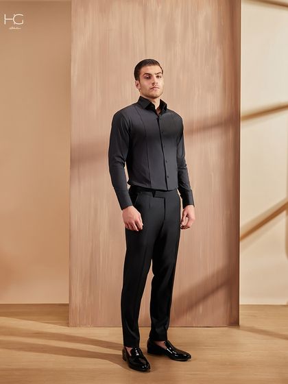 This tailored black shirt and trousers set is proof that true premium lies in the fit. The vertical paneling on the shirt creates a slimming, modern silhouette.
