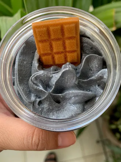 The Charcoal Coffee whipped soap, a detoxifying and energizing blend topped with a waffle-shaped soap embed.
