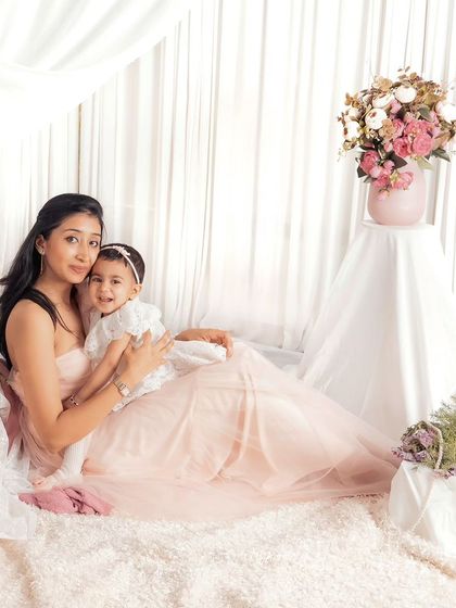 This mother and daughter duo is one of my all-time favorites. The soft, dreamy, all-white setup creates a beautiful and ethereal atmosphere for a mommy-and-me session.
