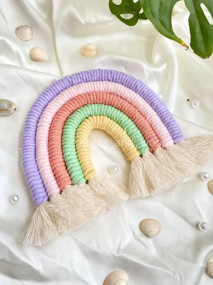 Another one of my favorite pastel combinations! This handmade rainbow wall decor is a perfect medium size to hang above a crib or changing table, adding a lovely handmade touch.