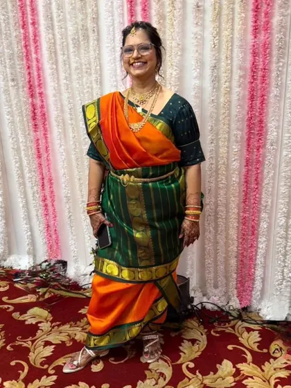 The joy of a mother on her daughter's wedding day, draped in a traditional Iyer Madisar. I had the honor of draping her, ensuring she felt comfortable and elegant throughout the celebrations.
