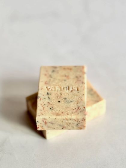 A stack of our Zero Waste Funfetti Soap. Each bar is unique, with a different combination of colorful soap shavings inside.