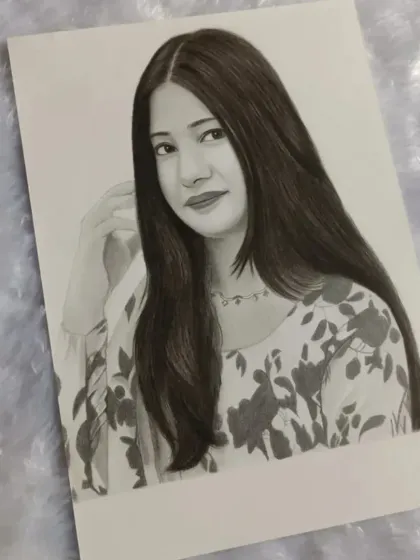 A beautiful A4 portrait for a client from Meerut. The floral pattern on her top was a lovely detail to recreate with graphite.