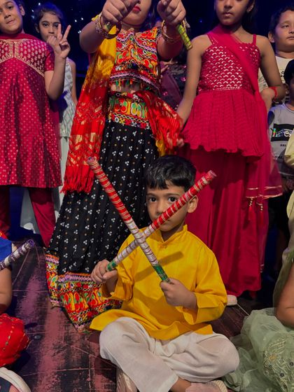 A close-up of one of our young performers, ready for his dandiya dance.