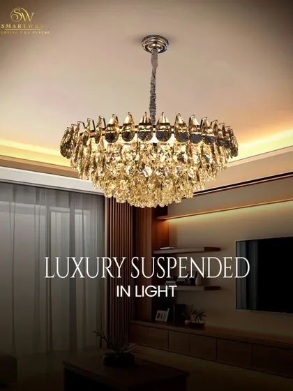 You can never go wrong with the timeless beauty of crystal. This suspended chandelier is pure luxury, with K9 crystals that sparkle and fill the room with brilliant light. It's a classic piece for any elegant living room.