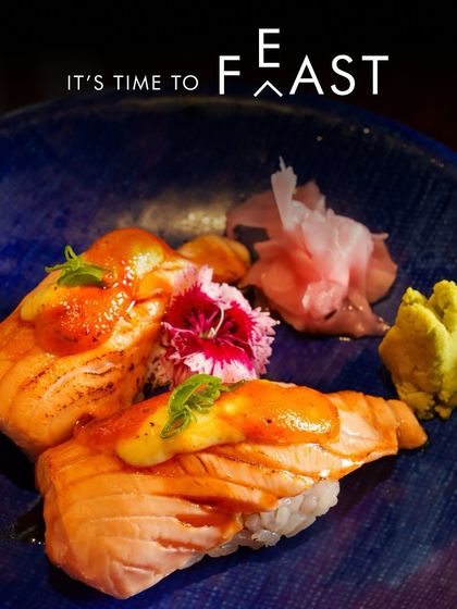 It's time to feast on this masterpiece. Our Aburi Salmon Nigiri, garnished with an edible flower, is a treat for anyone who appreciates bold, smoky flavors.