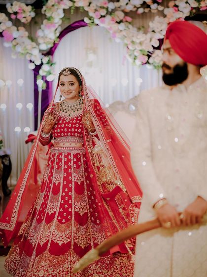 A beautiful shot from a Sikh wedding in Delhi, capturing the bride's first look at her groom. The anticipation and emotion in this moment are what I strive to document.