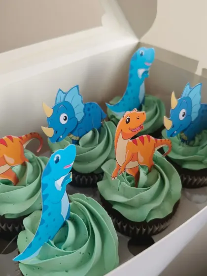 These dinosaur themed cupcakes are always a huge hit for kids' birthday parties. I use bright, fun colors and cute toppers to match your party's theme perfectly. These are my classic vanilla cupcakes with green vanilla frosting.