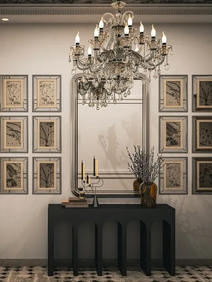 The console wall in our luxury foyer concept, featuring a gallery of botanical prints, a large mirror, and an elegant black console table.