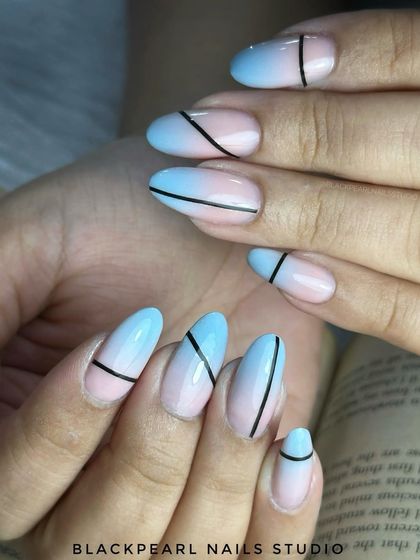 This set features a beautiful airbrush ombré effect with a soft pink-to-blue fade, accented with sleek black lines. It’s a bold yet sophisticated look that showcases advanced airbrushing techniques.