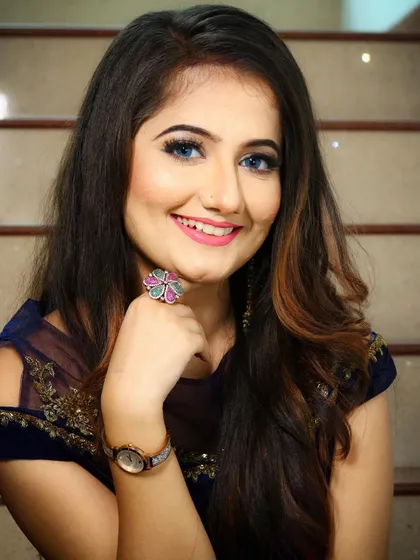The final look, a happy client ready for her event.