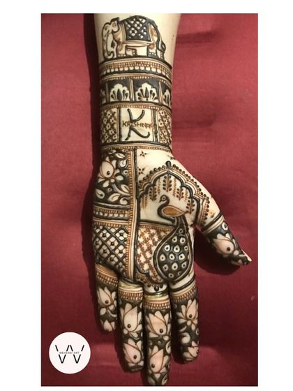 A special design for a "Grah Pravesh" or housewarming ceremony, personalized with the initial 'K' and traditional motifs.