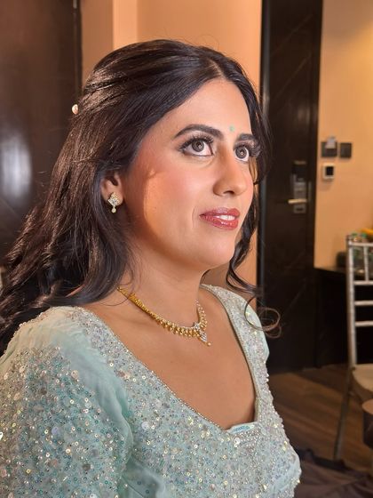 Another beautiful portrait, her eyes sparkling.