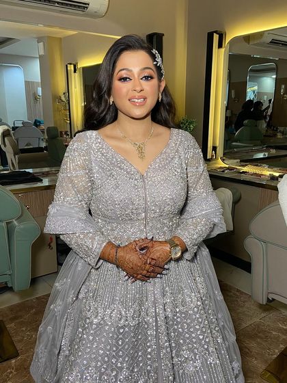 The full look for this dewy engagement bride. The elegant gown and soft, romantic makeup are a perfect match.