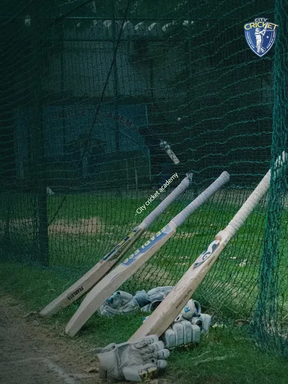 When everyone else is against you, your bat will always be by your side. A quiet moment at the nets before the action begins.