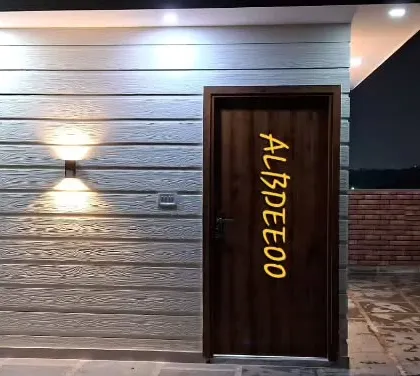 A collection of images from a rooftop study room project in Rohini. The photos show the stylish exterior at night, the clean and simple interior, and the quality of the finishing touches.