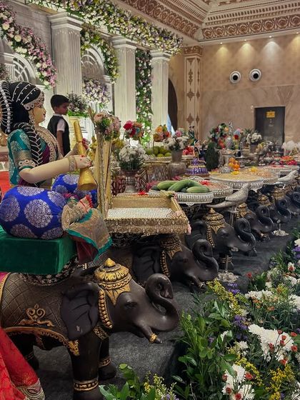 A side view of the classical stage, showing the line of elephant props and the traditional dolls.