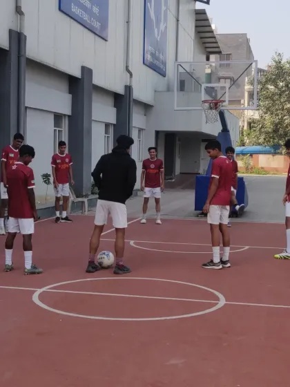 A pre-game warm-up on a basketball court, showing how we adapt and use different environments to sharpen skills.