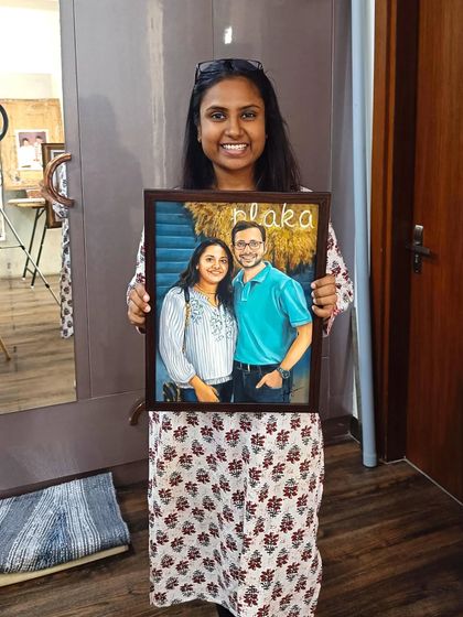 Here I am with another happy couple's portrait, ready for delivery.