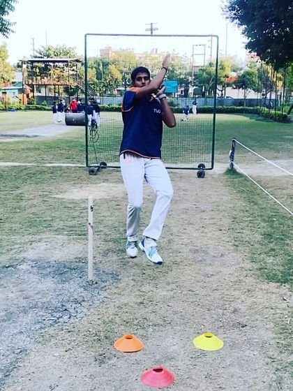 This image captures the perfect moment of release in a bowling action. We work on aligning the body to generate maximum force through the ball.