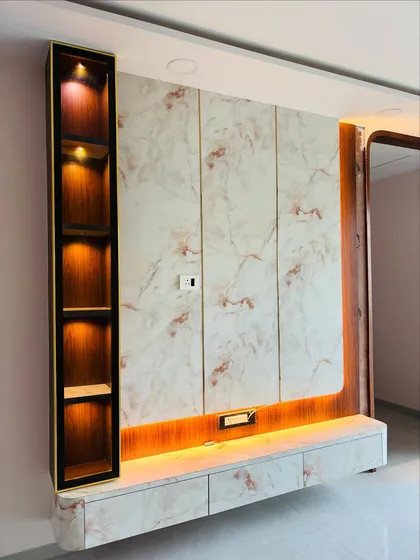 A slightly different perspective of the same TV unit, highlighting how the ambient lighting works to create a cozy atmosphere in the evening.