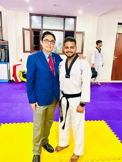 A proud moment receiving my 2nd Dan Black Belt from Grandmaster Pervez Khan, an 8th Dan Black Belt.