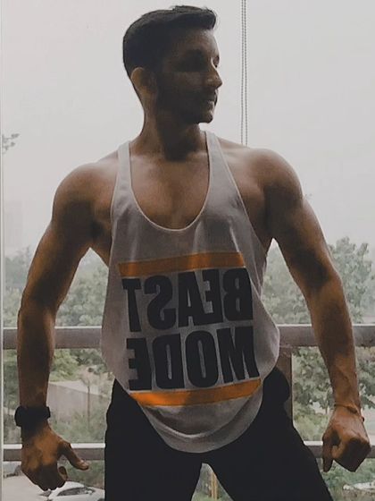 The struggle is real, but so are the results. This "Beast Mode" tank top isn't just for show, it's a mindset.