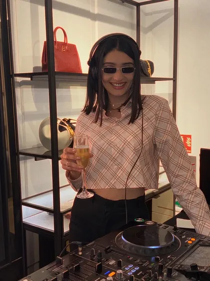 A candid shot from the Burberry event. The vibe was more relaxed and upscale, showing my versatility in creating different types of atmospheres.