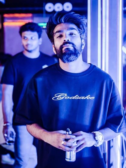 A stylish shot of me at The Fixx Bar, taking a moment between sets.