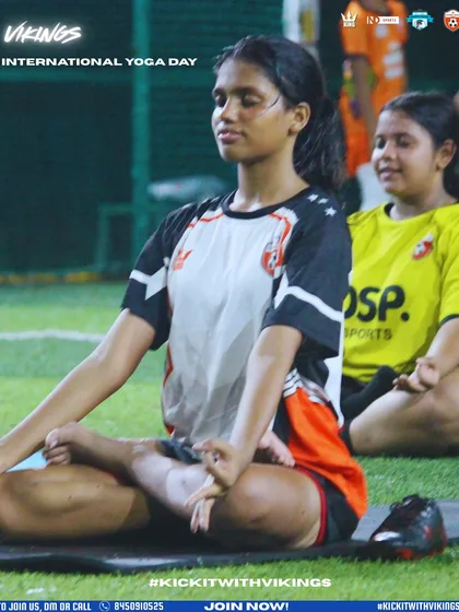A true warrior masters both body and mind. This image captures one of our players in a moment of focus during a yoga session, a key part of our holistic training program to improve flexibility and mental toughness on the field.