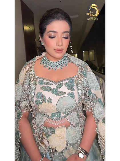 The complete look, with the textured ponytail adding a touch of modern glam.